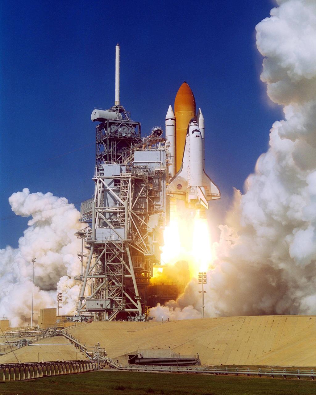 KENNEDY SPACE CENTER, FLA. - -- Space Shuttle Atlantis begins its journey to the International Space Station (ISS) as it lifts off from Launch Pad 39B on mission STS-112.   Liftoff occurred on time at 3:46 p.m. EDT.  Along with a crew of six, Atlantis carries the S1 Integrated Truss Structure and the Crew and Equipment Translation Aid (CETA) Cart A to the Space Station. The CETA is the first of two human-powered carts that will ride along the ISS railway, providing mobile work platforms for future spacewalking astronauts. On the 11-day mission, three spacewalks are planned to attach the S1 truss. 