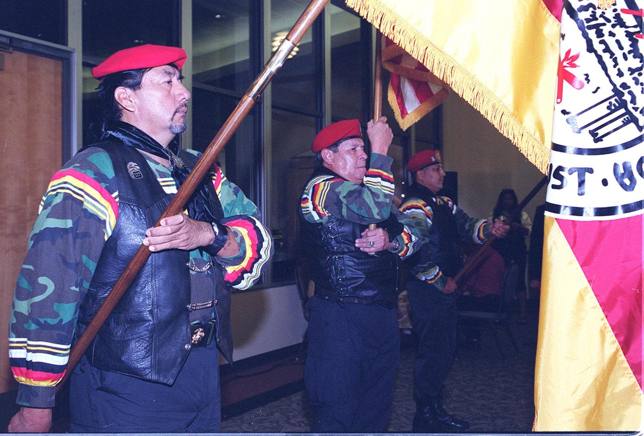 KENNEDY SPACE CENTER, FLA. --  -- The Seminole Native American Veterans Color Guard (Seminole Flag, U.S. Flag, and State of Florida Flag) present colors during a dinner at the Debus Conference Center in the KSC Visitor Complex.  The dinner honored John B. Herrington, the first tribally enrolled Native American astronaut to fly on a Shuttle mission.  Herrington is a Mission Specialist on STS-113.  In addition to the dinner at KSC, several hundred Native Americans from around the country attended a symposium in Orlando commemorating the launch event.   The Native Americans, many of them Chickasaw, were here to honor John, who is a Chickasaw from Oklahoma.   