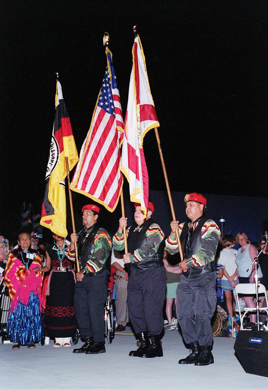KENNEDY SPACE CENTER, FLA. --  Seminole Native American Veterans serve as color guard during a pre-launch Native American ceremony at the Rocket Garden in the KSC Visitor Complex. David Nunez, U.S. Navy, carries the State of Florida Flag; David Stephen Bowers, U.S. Army, carries the Flag of the United States of America; Charles Billie Hiers, U.S. Marine Corps., carries the Seminole Tribe of Florida Flag. The ceremony was part of several days' activities commemorating John B. Herrington as the first tribally enrolled Native American astronaut to fly on a Shuttle mission. Herrington is a Mission Specialist on STS-113.      