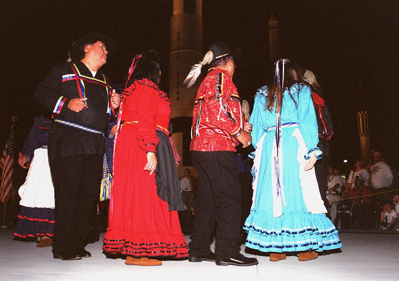 KENNEDY SPACE CENTER, FLA. -- The Chickasaw Dance Troupe performs an Honor Dance during the Native American Ceremony at the Rocket Garden in the KSC Visitor Complex. The ceremony was part of several days' activities commemorating John B. Herrington as the first tribally enrolled Native American astronaut to fly on a Shuttle mission. Herrington is a Mission Specialist on STS-113.      