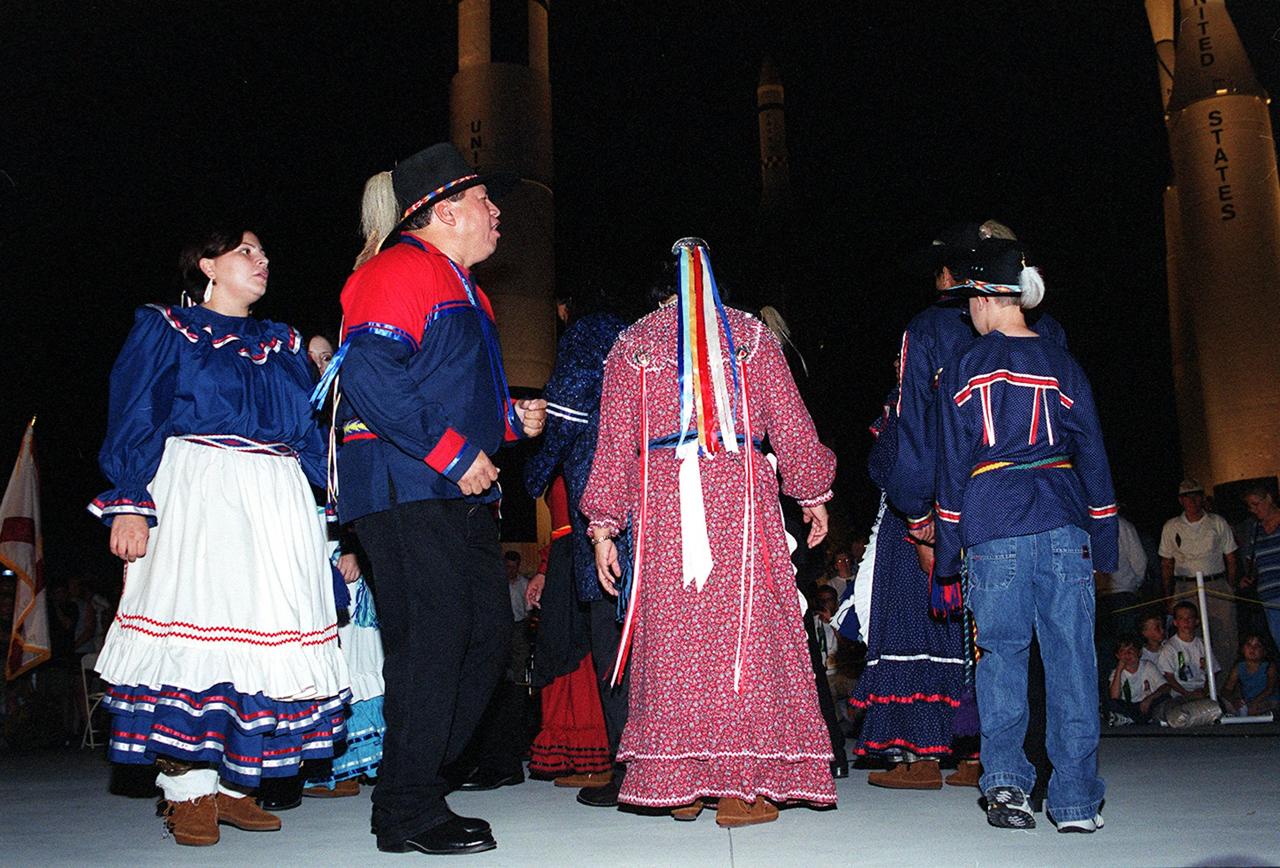 KENNEDY SPACE CENTER, FLA. -- The Chickasaw Dance Troupe performs an Honor Dance during the Native American Ceremony at the Rocket Garden in the KSC Visitor Complex. The ceremony was part of several days' activities commemorating John B. Herrington as the first tribally enrolled Native American astronaut to fly on a Shuttle mission. Herrington is a Mission Specialist on STS-113.      