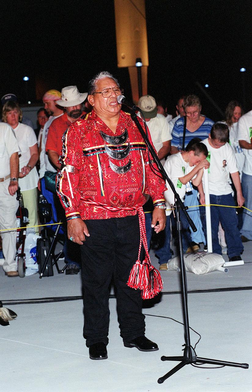 KENNEDY SPACE CENTER, FLA. -- Chickasaw Tribal Elder Lee Frazier leads the dedication to the astronauts of STS-113 during the Native American Ceremony at the Rocket Garden in the KSC Visitor Complex. The ceremony was part of several days' activities commemorating John B. Herrington as the first tribally enrolled Native American astronaut to fly on a Shuttle mission. Herrington is a Mission Specialist on STS-113.