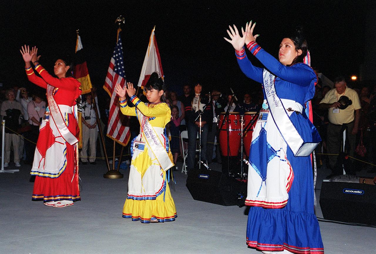 KENNEDY SPACE CENTER, FLA. - Chickasaw Indian princesses "sign" the Lord's Prayer during a Native American Ceremony at the Rocket Garden in the KSC Visitor Complex. The princesses are Crystal Underwood, Julie Underwood and Tamela Alexander.  The ceremony was part of several days' activities commemorating John B. Herrington as the first tribally enrolled Native American astronaut to fly on a Shuttle mission. Herrington is a Mission Specialist on STS-113.