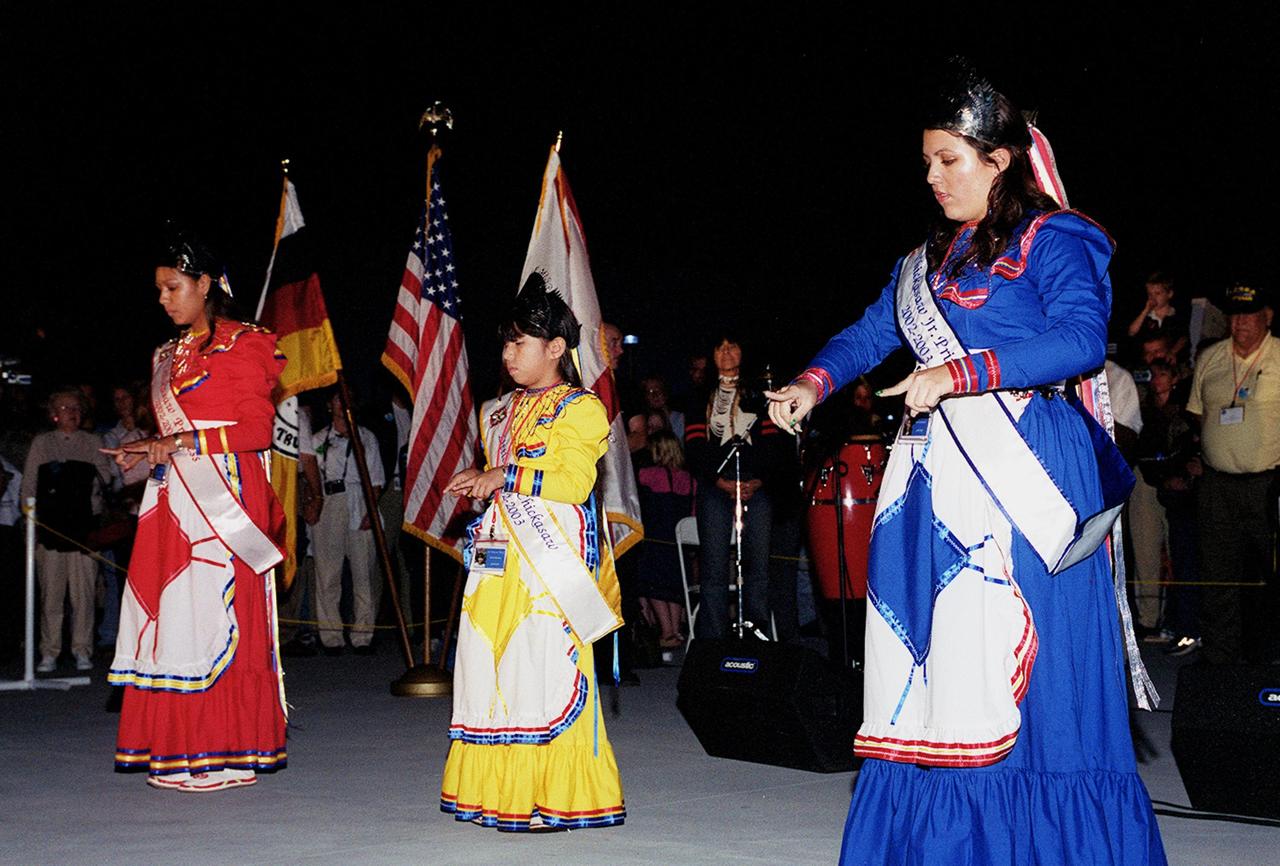 KENNEDY SPACE CENTER, FLA. - Chickasaw Indian princesses "sign" the Lord's Prayer during a Native American Ceremony at the Rocket Garden in the KSC Visitor Complex. The princesses are Crystal Underwood, Julie Underwood and Tamela Alexander.  The ceremony was part of several days' activities commemorating John B. Herrington as the first tribally enrolled Native American astronaut to fly on a Shuttle mission. Herrington is a Mission Specialist on STS-113.