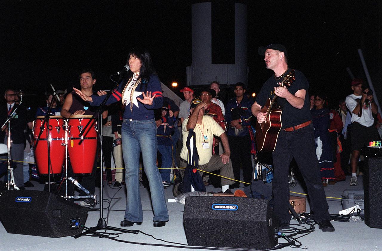 KENNEDY SPACE CENTER, FLA. --   Singer Buffy Sainte-Marie sings during a pre-launch Native American ceremony in the Rocket Garden of the KSC Visitor Complex.  She herself is a Cree. The ceremony was part of several days' activities commemorating John B. Herrington as the first tribally enrolled Native American astronaut to fly on a Shuttle mission. Herrington is a Mission Specialist on STS-113.      