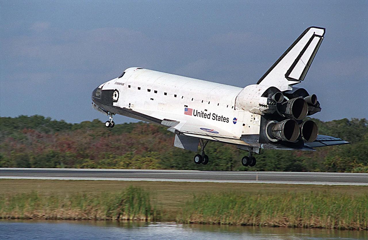 KENNEDY SPACE CENTER, FLA. -- Space Shuttle Endeavour is moments away from touching down on runway 33 at the Shuttle Landing Facility after completing the 13-day, 18-hour, 48-minute, 5.74-million mile STS-113 mission to the International Space Station. Main gear touchdown was at 2:37:12 p.m. EST, nose gear touchdown was at 2:37:23 p.m., and wheel stop was at 2:38:25 p.m. Poor weather conditions thwarted landing opportunities until a fourth day, the first time in Shuttle program history that a landing has been waved off for three consecutive days. The vehicle carries the STS-113 crew, Commander James Wetherbee, Pilot Paul Lockhart and Mission Specialists Michael Lopez-Alegria and John Herrington, as well as the returning Expedition Five crew, Commander Valeri Korzun, ISS Science Officer Peggy Whitson and Flight Engineer Sergei Treschev. The installation of the P1 truss on the International Space Station was accomplished during the mission.