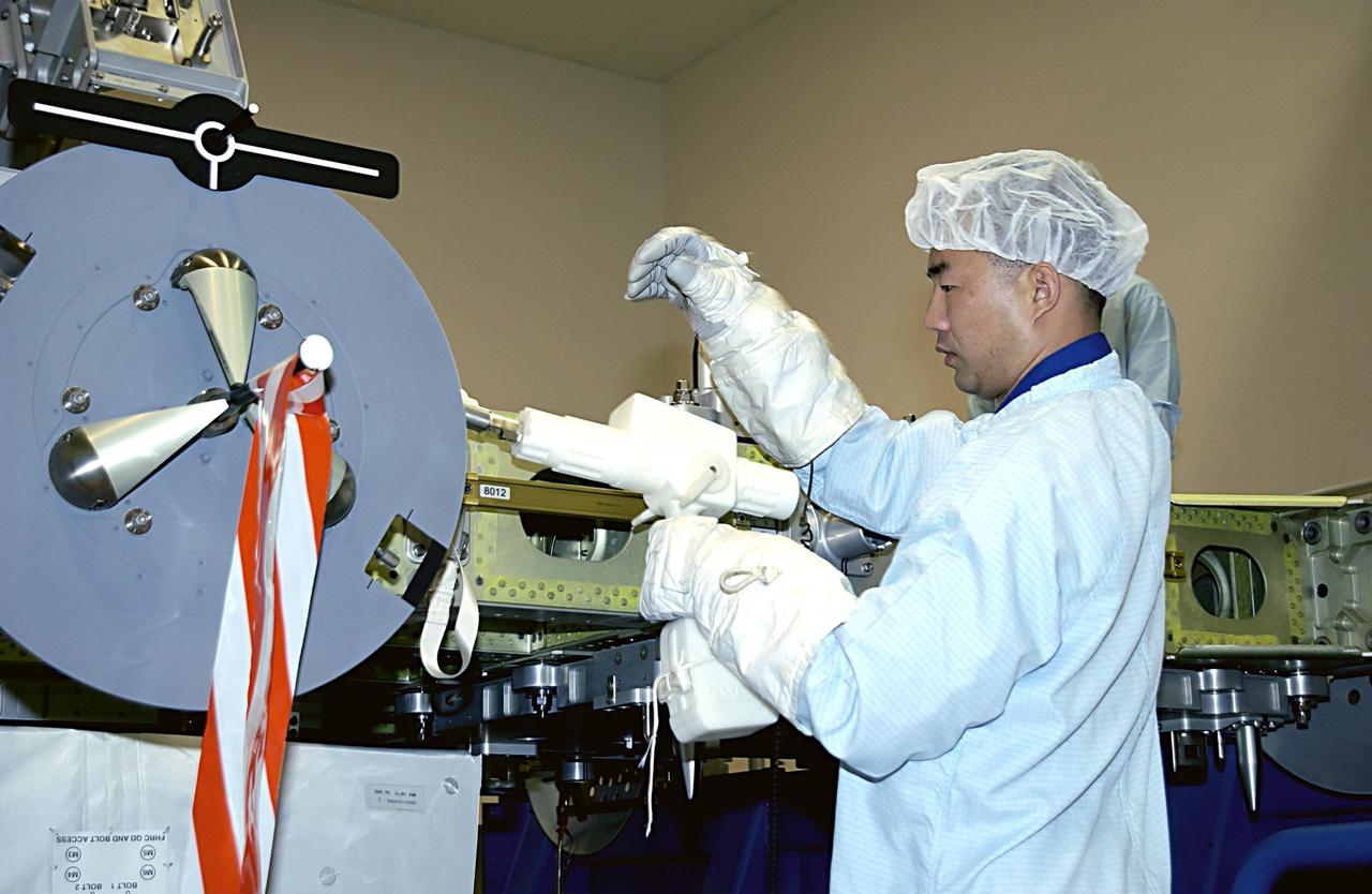 KENNEDY SPACE CENTER, FLA. -  At the SPACEHAB facility in Cape Canaveral, STS-114 Mission Specialist Soichi Noguchi, with the National Space Development Agency of Japan (NASDA), participates in familiarization activities with the hardware that will fly on the STS-114 mission. STS-114 is a utilization and logistics flight that will carry Multi-Purpose Logistics Module Raffaello and the External Stowage Platform (ESP-2), as well as the Expedition 7 crew, to the International Space Station. Launch is targeted for March 1, 2003.