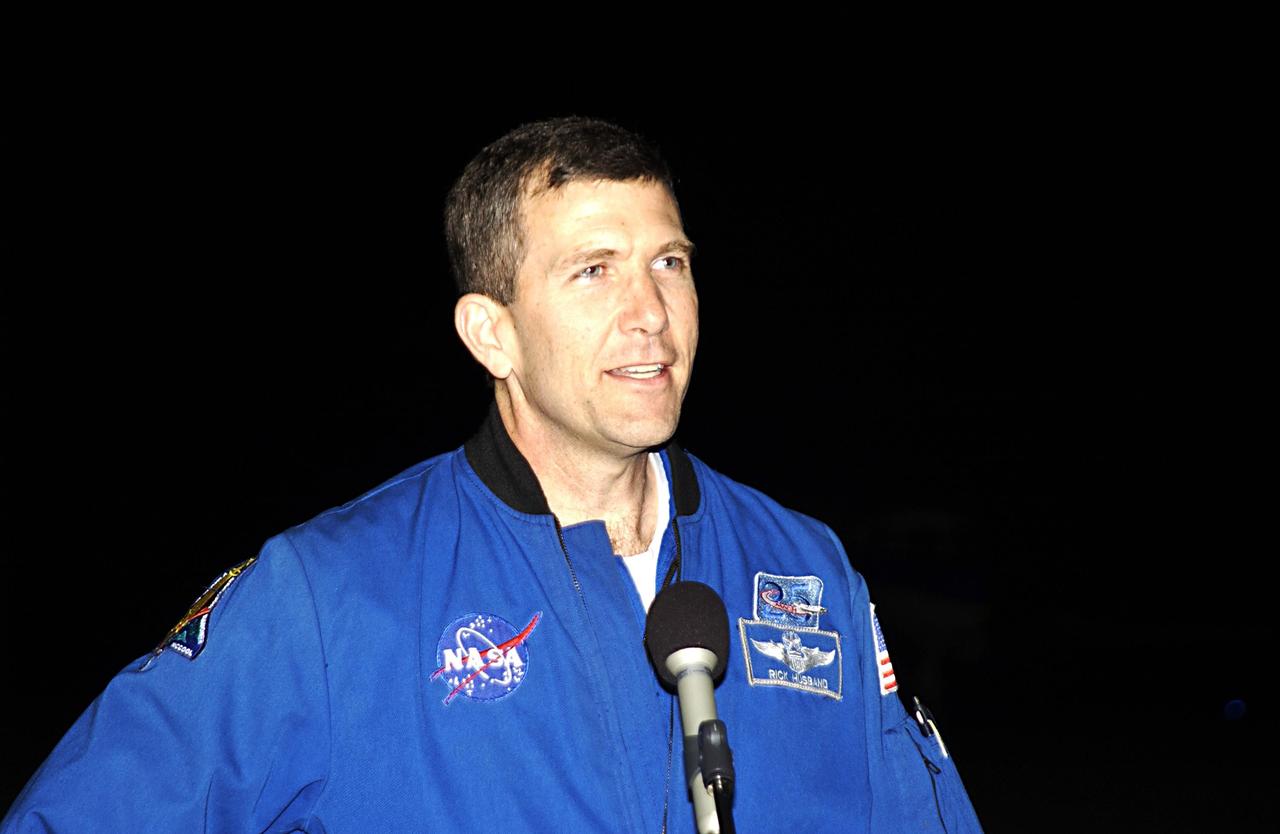 KENNEDY SPACE CENTER, FLA. --   STS-107 Commander Rick Husband makes a few comments after the crew's arrival at KSC for pre-launch preparations.  Other crew members are Pilot William "Willie" McCool, Payload Commander Michael Anderson, Payload Specialist Ilan Ramon, and Mission Specialists Kalpana Chawla, David Brown and Laurel Clark.  Ramon is the first Israeli astronaut to fly on a Shuttle mission.  STS-107 is a mission devoted to research and will include more than 80 experiments that will study Earth and space science, advanced technology development, and astronaut health and safety. The payload on Space Shuttle Columbia includes FREESTAR (Fast Reaction Experiments Enabling Science, Technology, Applications and Research) and the SHI Research Double Module (SHI/RDM), known as SPACEHAB.  Experiments on the module range from material sciences to life sciences. Launch of Columbia is targeted for Jan. 16 between 10 a.m. and 2 p.m.