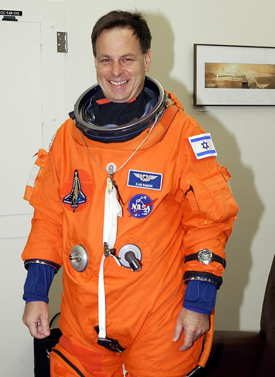 KENNEDY SPACE CENTER, FLA. --  STS-107 Payload Specialist Ilan Ramon, who represents the Israeli Space Agency, suits up for launch. STS-107 is a mission devoted to research and will include more than 80 experiments that will study Earth and space science, advanced technology development, and astronaut health and safety. The payload on Space Shuttle Columbia includes FREESTAR (Fast Reaction Experiments Enabling Science, Technology, Applications and Research) and the SHI Research Double Module (SHI/RDM), known as SPACEHAB.  Experiments on the module range from material sciences to life sciences.  Liftoff is scheduled for 10:39 a.m. EST.