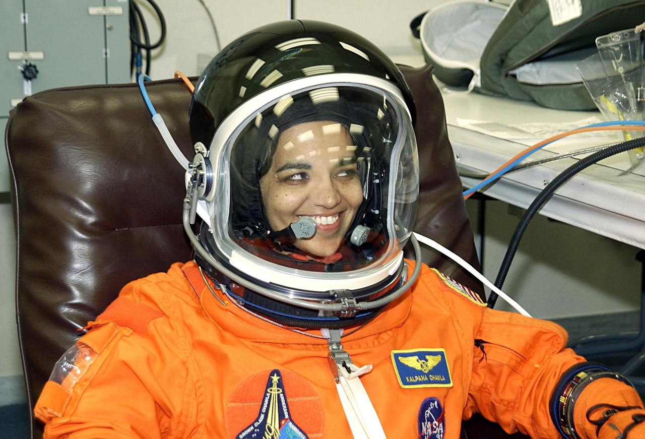 KENNEDY SPACE CENTER, FLA. --   STS-107 Mission Specialist Kalpana Chawla finishes suitup for launch. STS-107 is a mission devoted to research and will include more than 80 experiments that will study Earth and space science, advanced technology development, and astronaut health and safety. The payload on Space Shuttle Columbia includes FREESTAR (Fast Reaction Experiments Enabling Science, Technology, Applications and Research) and the SHI Research Double Module (SHI/RDM), known as SPACEHAB.  Experiments on the module range from material sciences to life sciences.  Liftoff is scheduled for 10:39 a.m. EST.