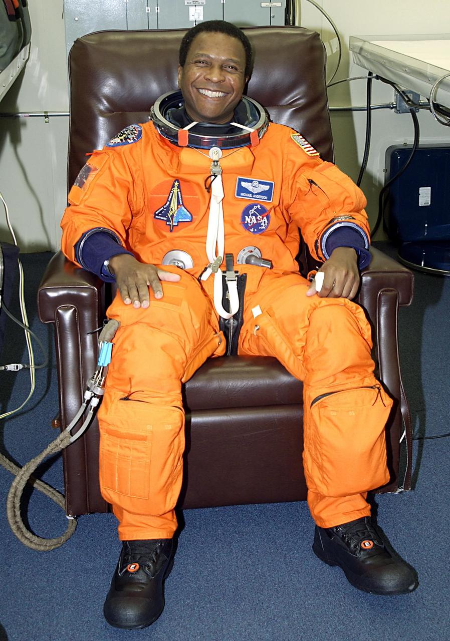 KENNEDY SPACE CENTER, FLA. - STS-107 Payload Commander Michael Anderson is happy to being suiting up for launch on mission STS-107. The mission is devoted to research and will include more than 80 experiments that will study Earth and space science, advanced technology development, and astronaut health and safety. The payload on Space Shuttle Columbia includes FREESTAR (Fast Reaction Experiments Enabling Science, Technology, Applications and Research) and the SHI Research Double Module (SHI/RDM), known as SPACEHAB.  Experiments on the module range from material sciences to life sciences.  Liftoff is scheduled for 10:39 a.m. EST.