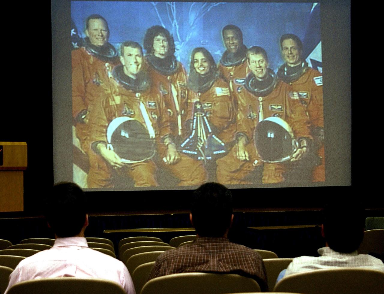 KENNEDY SPACE CENTER, FLA. --  Employees at KSC gather to watch the memorial service for the fallen seven astronauts of Columbia being held at Johnson Space Center, Houston, and broadcast on NASA television.      .  