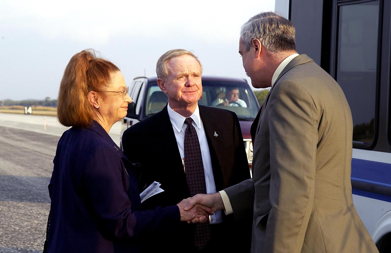 KENNEDY SPACE CENTER, FLA. -  A Columbia Crew Memorial Service is held at the Shuttle Landing Facility for KSC employees and invited guests, including KSC Director Roy Bridges (center) and NASA Administrator Sean O'Keefe (right).  The Columbia and her crew of seven were lost on Feb. 1, 2003, over East Texas as they returned to Earth after a 16-day research mission.  Taking part in the service were NASA Administrator Sean O’Keefe, former KSC Director Robert Crippen, astronaut Jim Halsell, several employees, area clergymen, and members of Patrick Air Force Base.  The service concluded with a “Missing Man Formation Fly Over” by NASA T-38 jet aircraft.