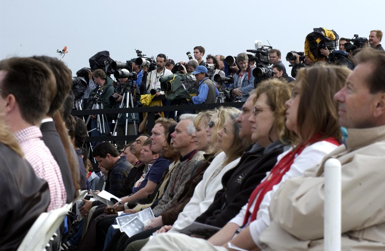 KENNEDY SPACE CENTER, FLA. -  A Columbia Crew Memorial Service is held at the Shuttle Landing Facility for KSC employees and invited guests.  The Columbia and her crew of seven were lost on Feb. 1, 2003, over East Texas as they returned to Earth after a 16-day research mission.  Taking part in the service were NASA Administrator Sean O’Keefe, former KSC Director Robert Crippen, astronaut Jim Halsell, several employees, area clergymen, and members of Patrick Air Force Base.  The service concluded with a “Missing Man Formation Fly Over” by NASA T-38 jet aircraft.