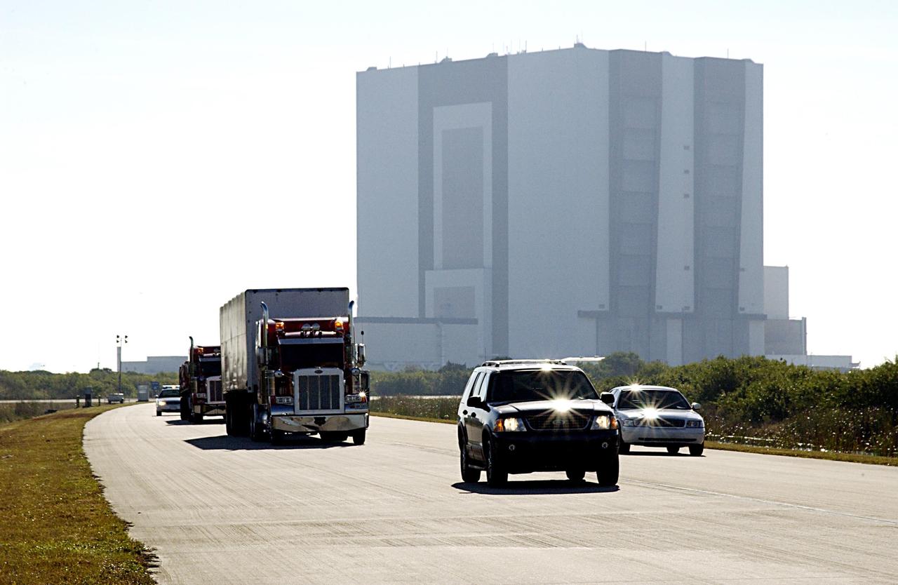 KENNEDY SPACE CENTER, FLA. - Truckloads of recovered Columbia debris arrive at KSC from the collection point at Barksdale Air Force Base, Shreveport, La. They will be taken to the RLV Hangar near the Shuttle Landing Facility. Workers there will attempt to reconstruct the orbiter as part of the ongoing investigation of the accident that destroyed the Columbia and claimed the lives of seven astronauts as they returned to Earth after a 16-day research mission, STS-107.