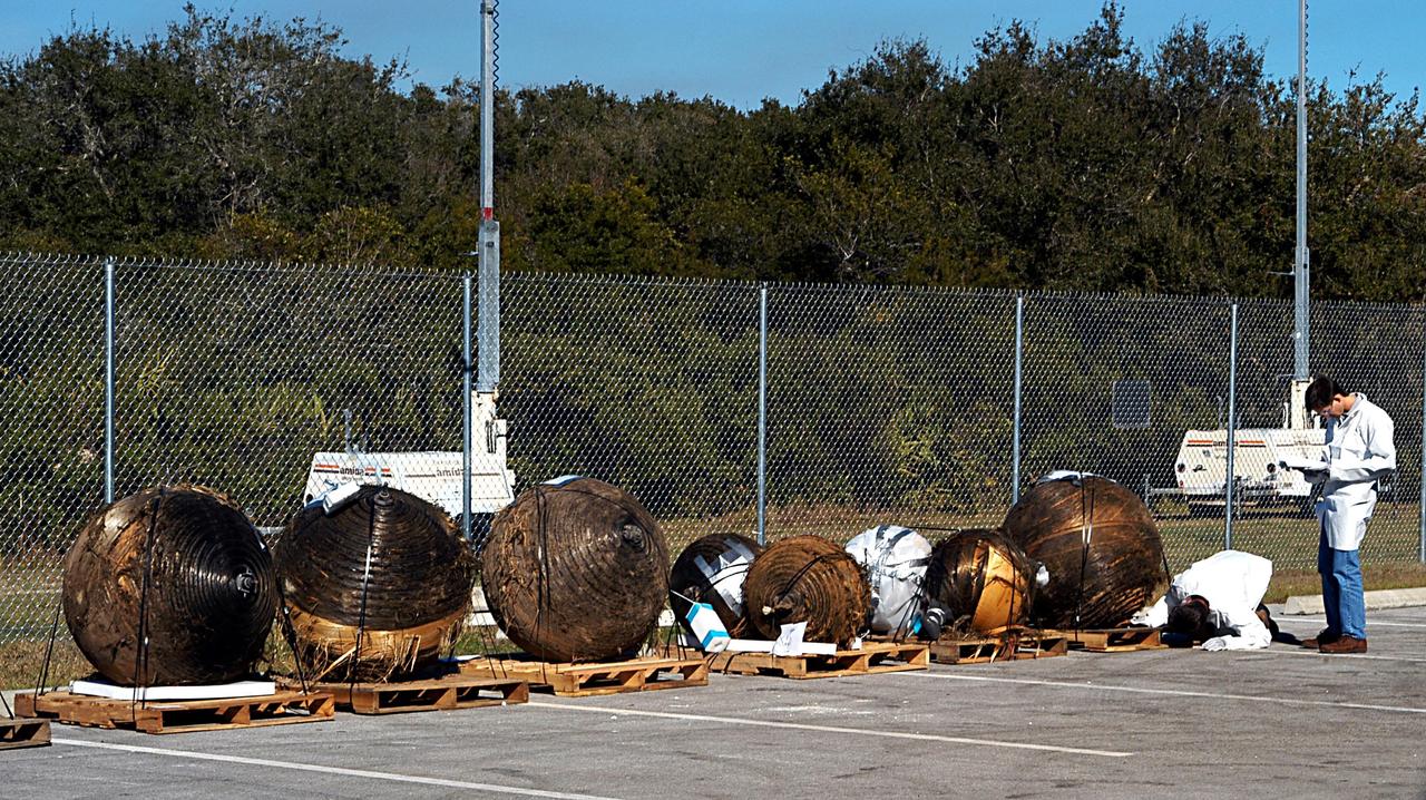 KENNEDY SPACE CENTER, FLA. - Columbia debris arriving at KSC from the collection point at Barksdale Air Force Base, Shreveport, La., awaits identification and placement in the RLV Hangar near the Shuttle Landing Facility. Workers there will attempt to reconstruct the orbiter as part of the ongoing investigation of the accident that destroyed the Columbia and claimed the lives of seven astronauts as they returned to Earth after a 16-day research mission, STS-107.