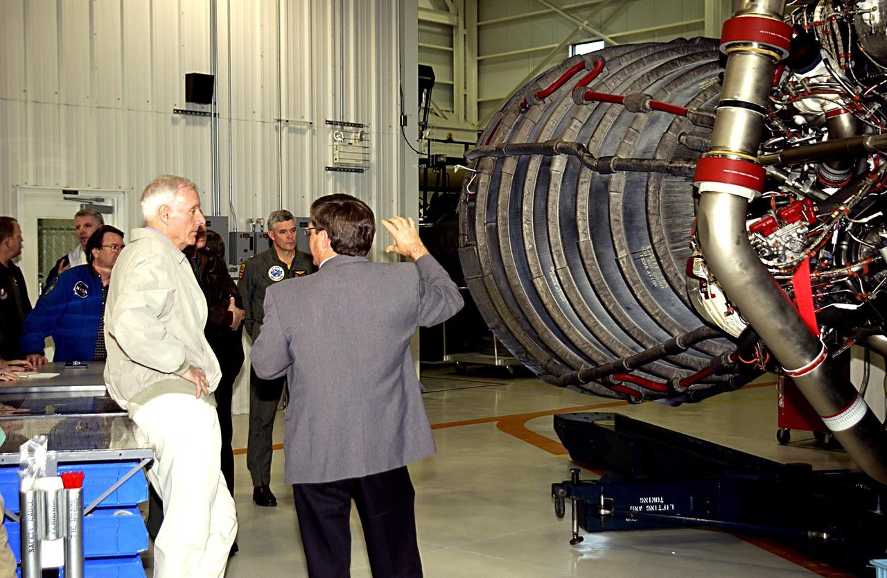 KENNEDY SPACE CENTER, FLA. - Retired Navy Admiral Harold W. Gehman Jr. (left), chairman of the Columbia Accident Investigation Board, is given a guided tour of the Space Shuttle Main Engine shop. Gehman and other members of the board are visiting sites at KSC to become familiar with the Shuttle launch process. The independent board is charged with determining what caused the destruction of the Space Shuttle Columbia and the loss of its seven-member crew on Feb. 1 during reentry.