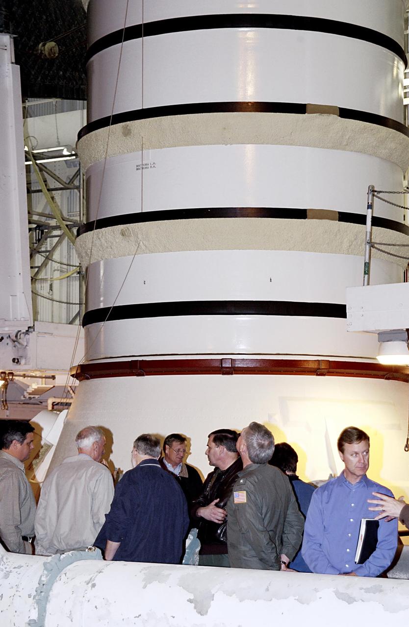 KENNEDY SPACE CENTER, FLA. --  Members of the Columbia Accident Investigation Board look at one of the solid rocket boosters on Space Shuttle Atlantis in the Vehicle Assembly Building. The board is visiting sites at KSC to become familiar with the Shuttle launch process and elements. The independent board is charged with determining what caused the destruction of the Space Shuttle Columbia and the loss of its seven-member crew on Feb. 1 during reentry.