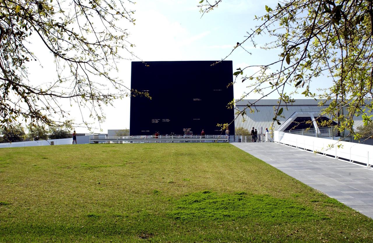 KENNEDY SPACE CENTER, FLA. - A view of the Astronaut Memorial Space Mirror at the KSC Visitor Complex.  The memorial is a national tribute to 17 American astronauts who previously gave their lives to the quest to explore space.  The memorial has had added attention since the loss of the Columbia crew Feb. 1, 2003, when they died in an explosion as they were returning to Earth from mission STS-107.