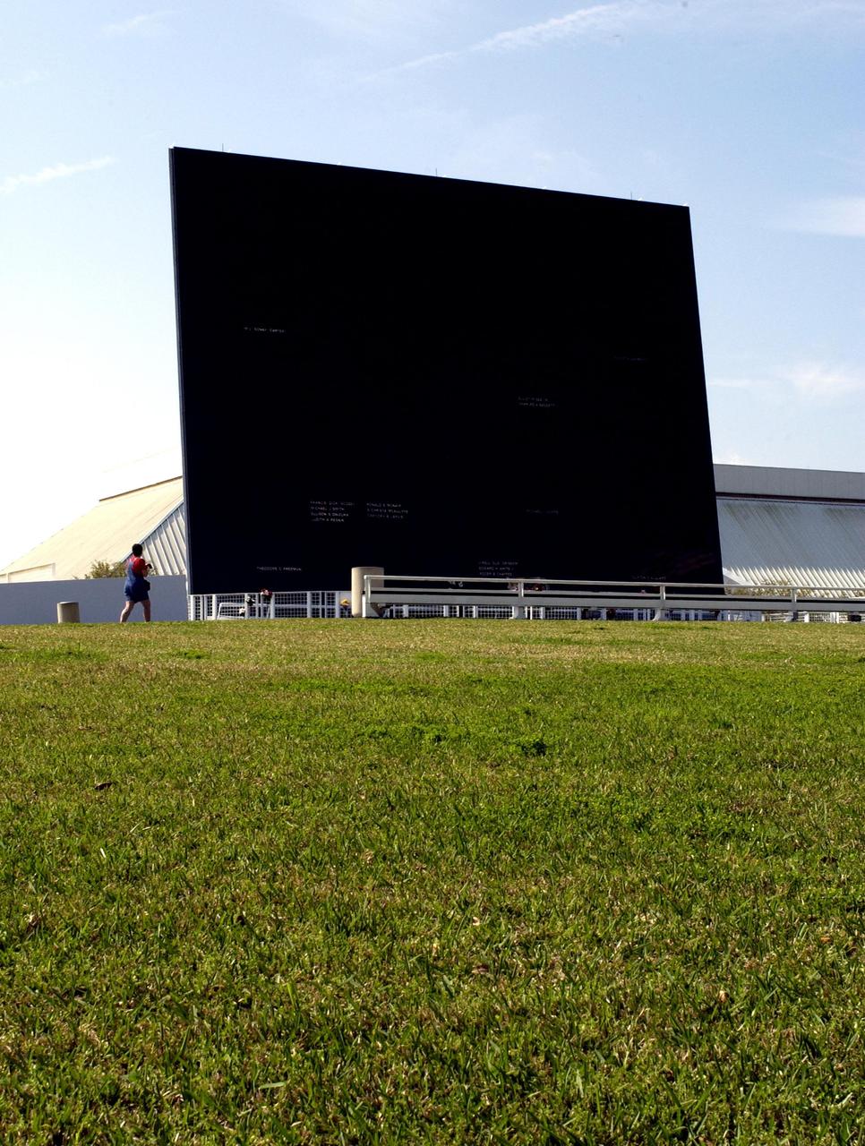 KENNEDY SPACE CENTER, FLA. - A view of the Astronaut Memorial Space Mirror at the KSC Visitor Complex. The memorial is a national tribute to 17 American astronauts who previously gave their lives to the quest to explore space.  The memorial has had added attention since the loss of the Columbia crew Feb. 1, 2003, when they died in an explosion as they were returning to Earth from mission STS-107.