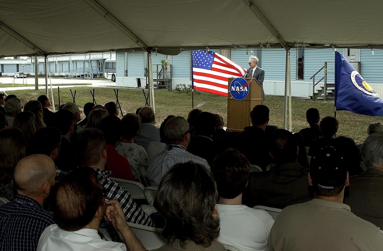 KENNEDY SPACE CENTER, FLA. -- Center Director Roy Bridges speaks to attendees at the groundbreaking for the Operations Support Building II. The audience included representatives of Governor Jeb Bush and the state of Florida.  The new building will replace modular housing constructed more than 20 years ago and house NASA and contractor support staff for shuttle operations.  The demolition of the modular buildings has begun and construction will immediately follow.  The new structure is projected to be ready in April 2005.