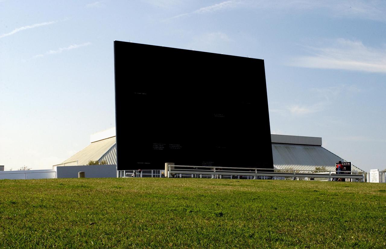 KENNEDY SPACE CENTER, FLA. -- A view of the Astronaut Memorial Space Mirror at the KSC Visitor Complex. The memorial is a national tribute to 17 American astronauts who previously gave their lives to the quest to explore space.  The memorial has had added attention since the loss of the Columbia crew Feb. 1, 2003, when they died in an explosion as they were returning to Earth from mission STS-107.