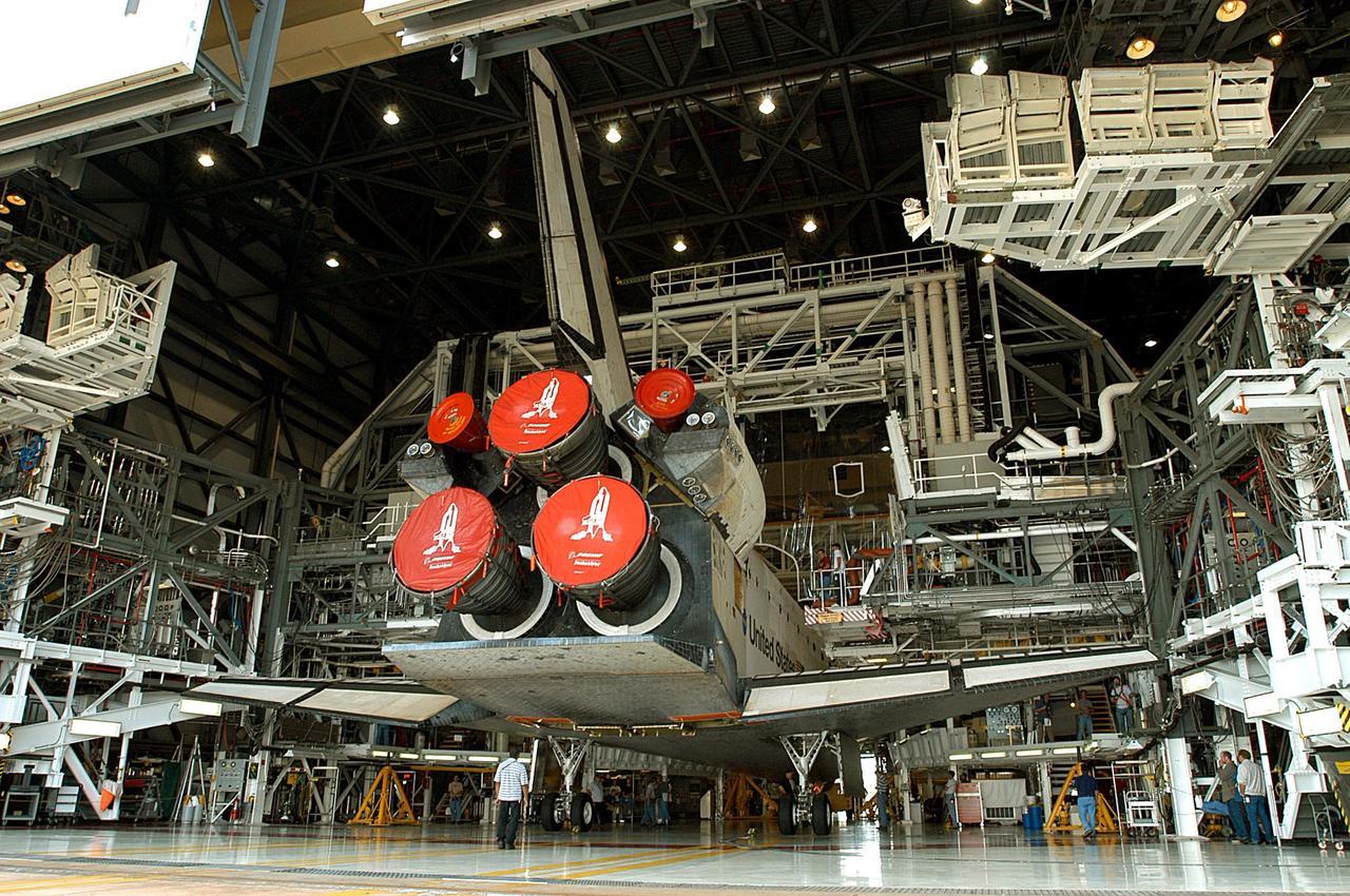 KENNEDY SPACE CENTER, Fla. - Atlantis is towed into the Orbiter Processing Facility. Not currently in preparation for flight, the orbiter was moved from the Vehicle Assembly Building.