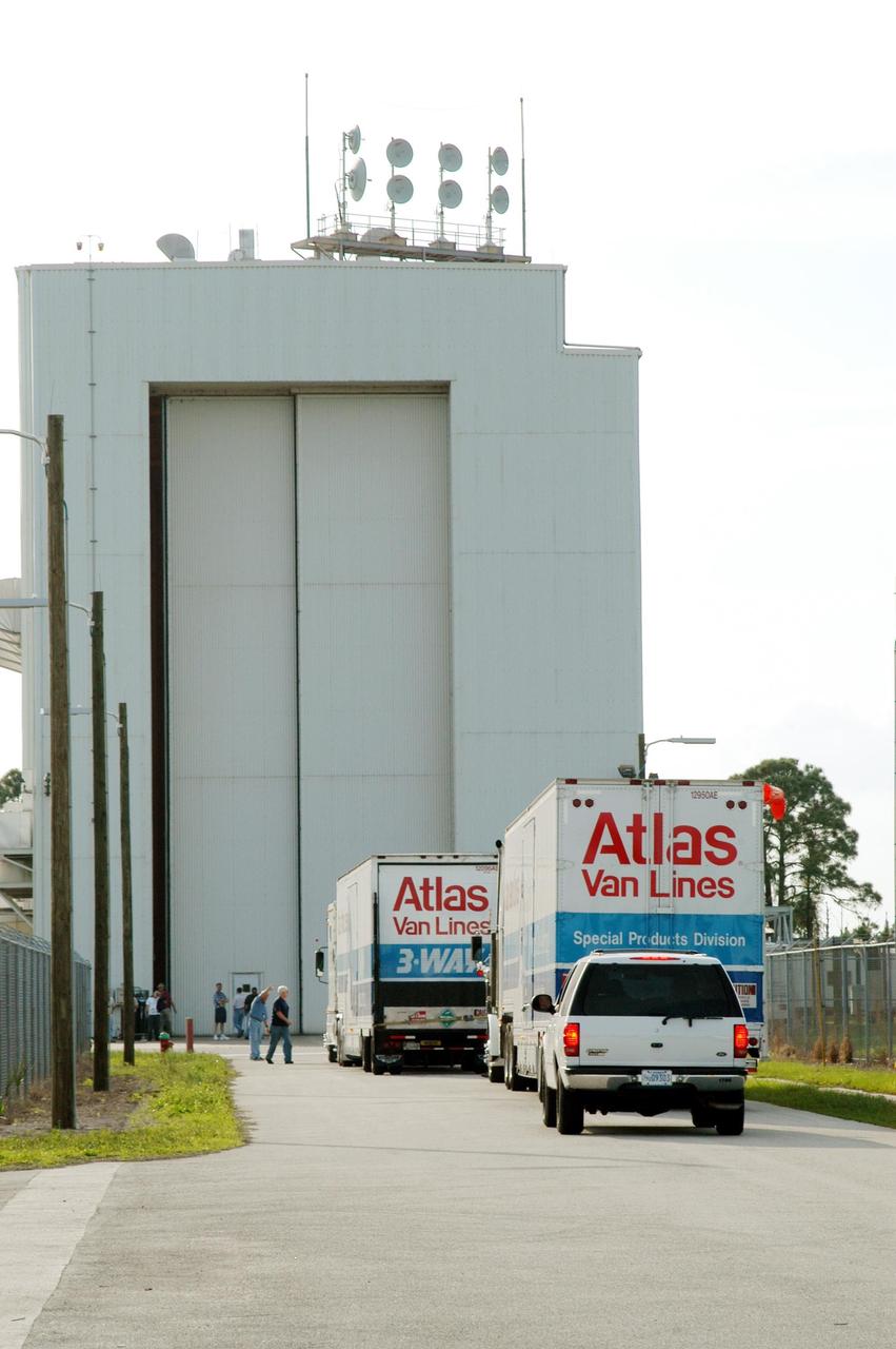 KENNEDY SPACE CENTER, Fla. - The second Mars Exploration Rover (MER-1) arrives at the Payload Hazardous Servicing Facility. MER-2 and other hardware have already arrived at KSC for processing. While at KSC, each of the rovers, their aeroshells and landers will undergo a full mission simulation. After spin balance testing, each spacecraft will be mated to a solid propellant upper stage booster that will propel the spacecraft out of Earth orbit. Approximately 10 days before launch they will be transported to the launch pad for mating with their respective Boeing Delta II rockets. The rovers will serve as robotic geologists to seek answers about the evolution of Mars, particularly for a history of water. The rovers are identical to each other, and will land at different regions of Mars. Launch of the MER-1 is scheduled for May 30. MER-2 will follow June 25.