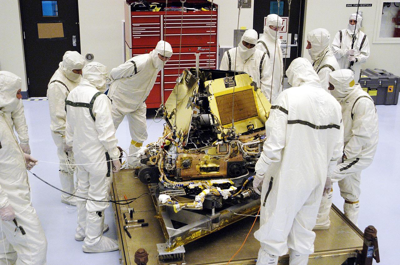 KENNEDY SPACE CENTER, Fla. - Mars Exploration Rover-1 is ready for prelaunch testing including deployment of the lander petals, the rover's solar arrays, camera mast and camera. While at KSC, each of the rovers, their aeroshells and landers will undergo a full mission simulation. After spin balance testing, each spacecraft will be mated to a solid propellant upper stage booster that will propel the spacecraft out of Earth orbit. Approximately 10 days before launch they will be transported to the launch pad for mating with their respective Boeing Delta II rockets. The rovers will serve as robotic geologists to seek answers about the evolution of Mars, particularly for a history of water. The rovers are identical to each other, and will land at different regions of Mars. Launch of the MER-1 is scheduled for May 30. MER-2 will follow June 25.