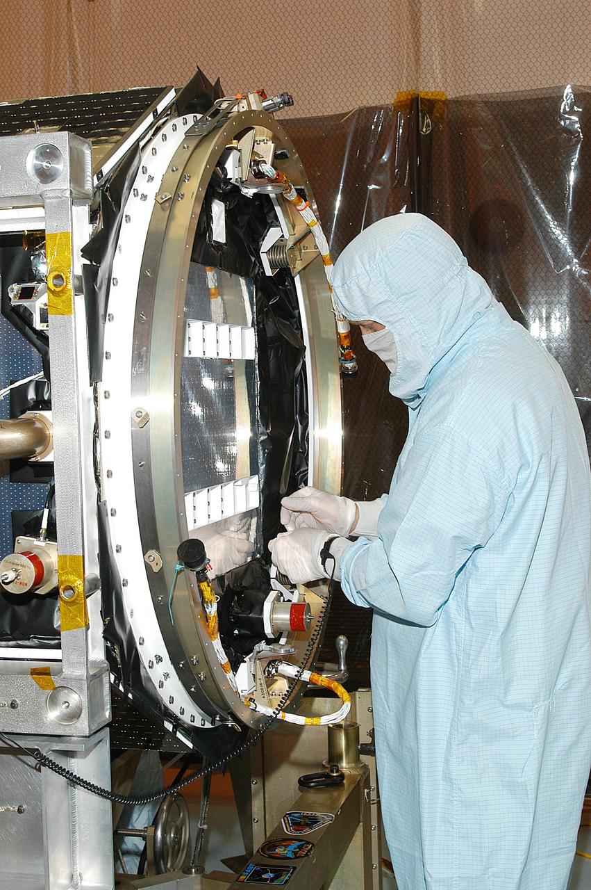 KENNEDY SPACE CENTER, FLA. -- -- In the Multi-Payload Processing Facility, NASA's Galaxy Evolution Explorer is prepared for mating with the Pegasus XL launch vehicle. The GALEX, set to launch April 2 from Cape Canaveral Air Force Station, will carry into space an orbiting telescope that will observe a million galaxies across 10 billion years of cosmic history to help astronomers determine when the stars and elements we see today had their origins. The spacecraft will sweep the skies for 28 months using state-of-the-art ultraviolet detectors to single out galaxies dominated by young, hot, short-lived stars that give off a great deal of energy at that wavelength.  These galaxies are actively creating stars, and therefore provide a window into the history and causes of star formation in galaxies.