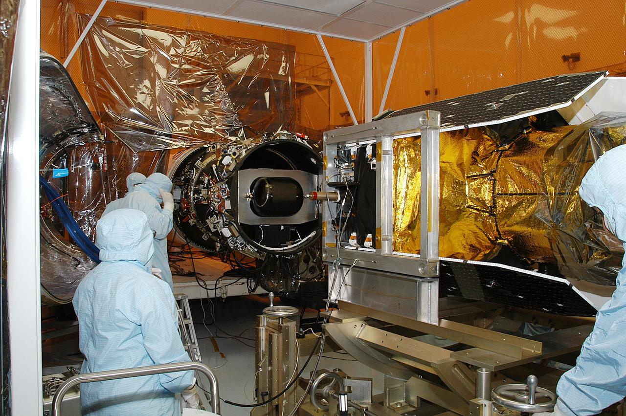 KENNEDY SPACE CENTER, FLA. -- In the Multi-Payload Processing Facility, NASA's Galaxy Evolution Explorer is prepared for mating with the Pegasus XL launch vehicle. The GALEX, set to launch April 2 from Cape Canaveral Air Force Station, will carry into space an orbiting telescope that will observe a million galaxies across 10 billion years of cosmic history to help astronomers determine when the stars and elements we see today had their origins. The spacecraft will sweep the skies for 28 months using state-of-the-art ultraviolet detectors to single out galaxies dominated by young, hot, short-lived stars that give off a great deal of energy at that wavelength.  These galaxies are actively creating stars, and therefore provide a window into the history and causes of star formation in galaxies.