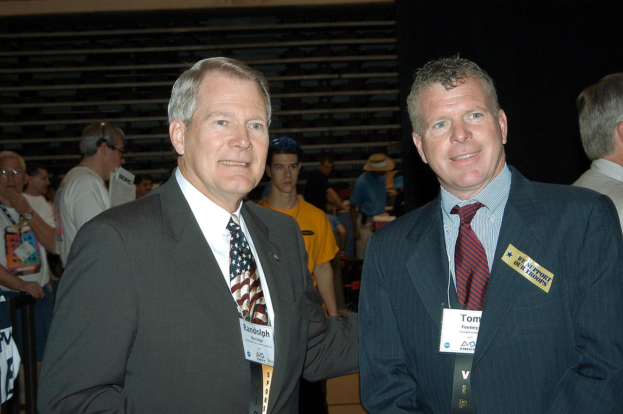 KENNEDY SPACE CENTER, FLA. -  Randolph E. Berridge, president of the Florida High Tech Corridor Council, and Tom Feeney, Florida Representative from the 24th District, attend the 2003 Southeastern Regional FIRST Robotic Competition. The competition is being held at the University of Central Florida (UCF) in Orlando, March 20-23. Forty student teams from around the country are participating in the event that pits team-built gladiator robots against each other in an athletic-style competition. The teams are sponsored by NASA/Kennedy Space Center, The Boeing Company/Brevard Community College, and Lockheed Martin Space Operations/Mission Systems for the nonprofit organization For Inspiration and Recognition of Science and Technology, known as FIRST. The vision of FIRST is to inspire in the youth of our nation an appreciation of science and technology and an understanding that mastering these disciplines can enrich the lives of all mankind.