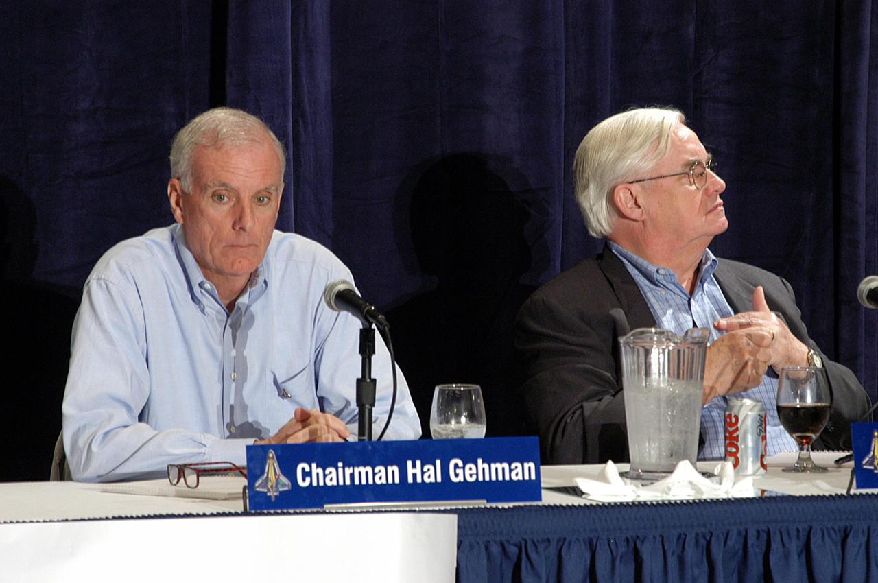 KENNEDY SPACE CENTER, FLA. -  Retired Navy Admiral Harold W. "Hal" Gehman Jr., chairman of the Columbia Accident Investigation Board, and board member Dr. John Logsdon, director of the Space Policy Institute, George Washington University, listen to expert information about the role of the Kennedy Space Center in the Shuttle Program, Shuttle Safety and Debris Collection, Layout and Analysis and Forensic Metallurgy.  This was the third public hearing of the board, which was held in Cape Canaveral, Fla.