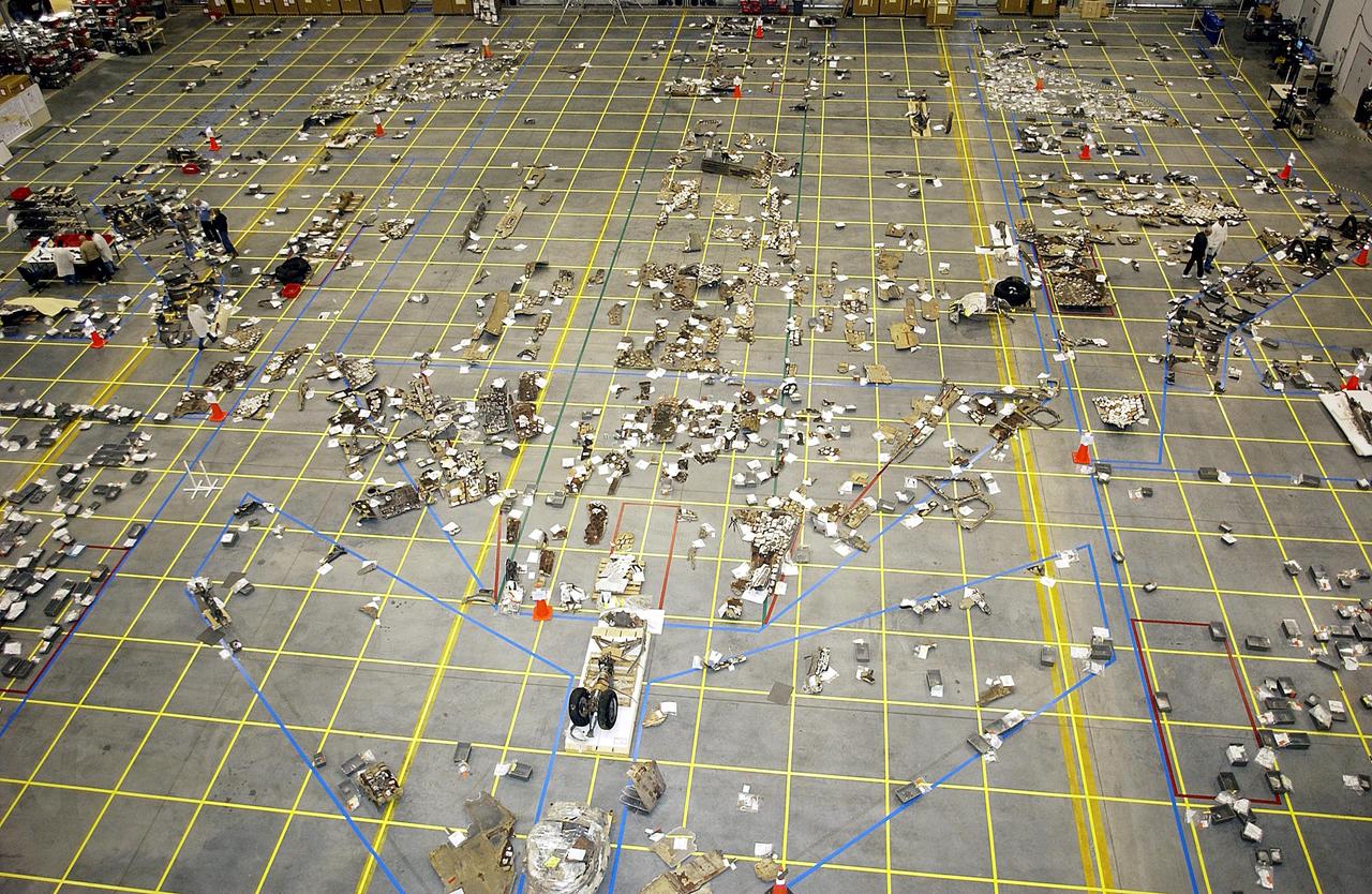 KENNEDY SPACE CENTER, FLA. -  An overview of the floor of the RLV Hangar shows some of the Columbia debris collected and identified. Approximately 4,500 ground searchers have covered approximately 56 percent of the planned 555,000-acre search area. About 28 percent of the Shuttle Columbia, by weight, has been delivered to the RLV Hangar to date.
