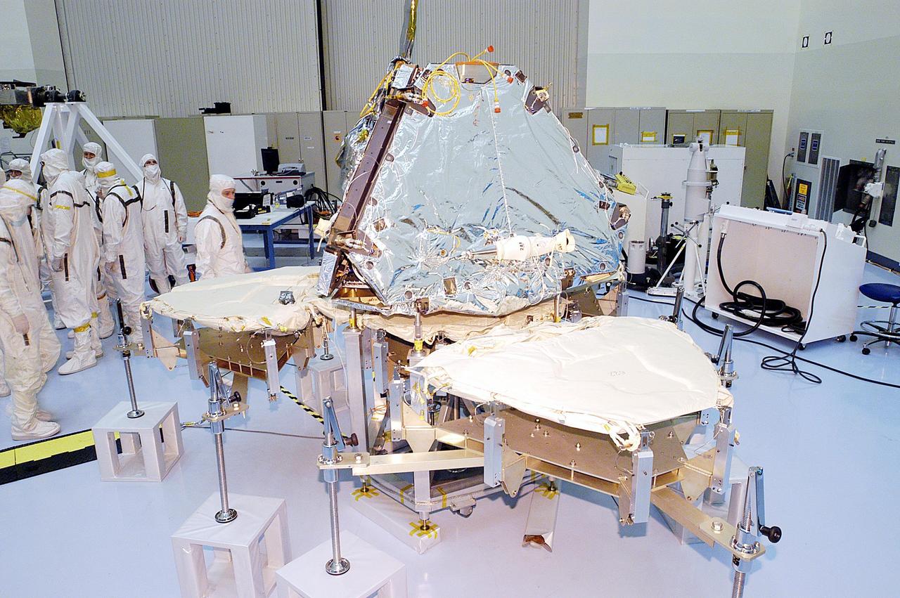 KENNEDY SPACE CENTER, FLA. -  The two elements, rover and lander, of Mars Exploration Rover 2 (MER-2) are assembled.  Set to launch in Spring 2003, the MER Mission consists of two identical rovers.  Landing at different regions of Mars, they are designed to cover roughly 110 yards each Martian day over various terrain. Each rover will carry five scientific instruments that will allow it to search for evidence of liquid water that may have been present in the planet's past.  The first rover has a launch window opening May 30, and the second rover a window opening June 25.