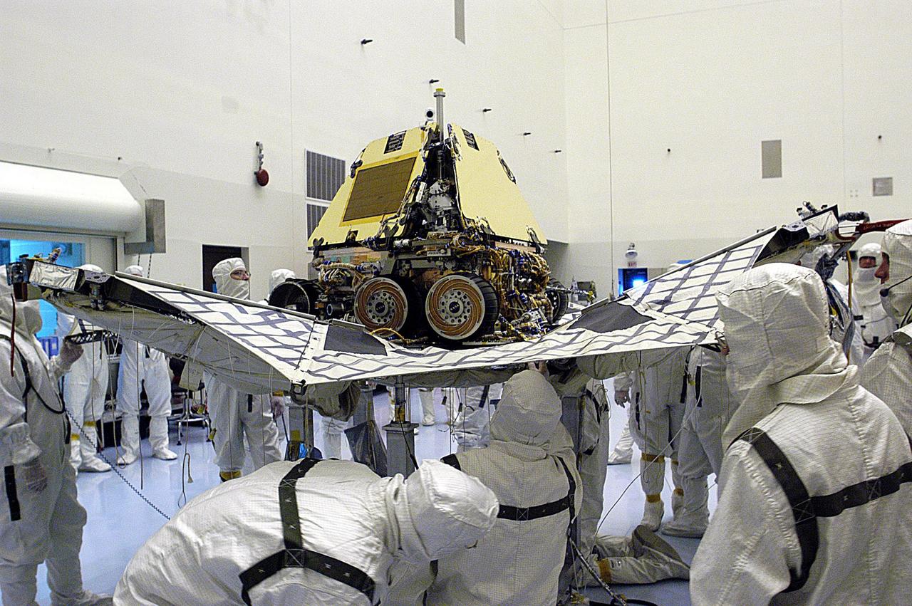 KENNEDY SPACE CENTER, FLA. -- In the Payload Hazardous Servicing Facility, the lander petals and attached airbags of the Mars Exploration Rover 2 (MER-2) are closed around the spacecraft during testing prior to launch.  The MER Mission consists of two identical rovers set to launch in Spring 2003. Landing at different regions of Mars, they are designed to cover roughly 110 yards each Martian day over various terrain. Each rover will carry five scientific instruments that will allow it to search for evidence of liquid water that may have been present in the planet's past.