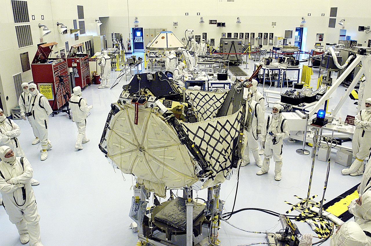 KENNEDY SPACE CENTER, FLA. -- In the Payload Hazardous Servicing Facility, the lander petals and attached airbags of the Mars Exploration Rover 2 (MER-2) are closed around the spacecraft during testing prior to launch.  The MER Mission consists of two identical rovers set to launch in Spring 2003. Landing at different regions of Mars, they are designed to cover roughly 110 yards each Martian day over various terrain. Each rover will carry five scientific instruments that will allow it to search for evidence of liquid water that may have been present in the planet's past.