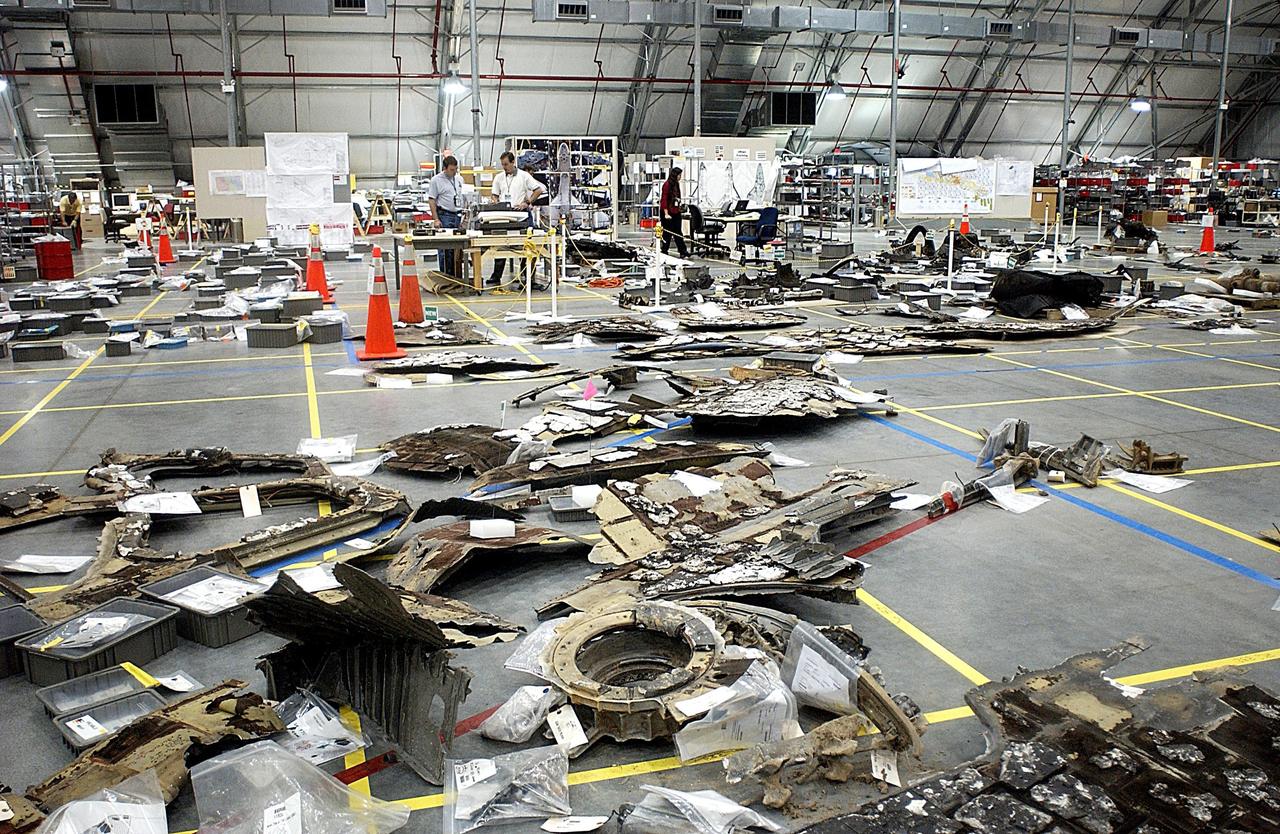 KENNEDY SPACE CENTER, FLA. -- The floor of the KSC RLV Hangar is filled with pieces of Columbia debris gathered by search teams and shipped from Barksdale Air Force Base, Shreveport, La. Ground teams have completed 78 percent of their primary search area, and airborne crews finished 80 percent of their assigned area. More than 70,000 items, weighing 78,000 pounds, about 36 percent of the Shuttle by weight, have been delivered to KSC for use in the mishap investigation. Search teams have completed 98 percent of the underwater searches in Lake Nacogdoches and Toledo Bend Reservoir.