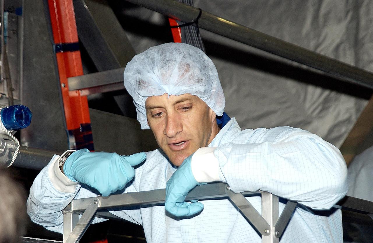 KENNEDY SPACE CENTER, FLA. - STS-118 Pilot Charles Hobaugh looks at equipment in the Space Station Processing Facility.  She and other crew members are at KSC to become familiar with equipment for their mission.  The mission will be delivering the third starboard truss segment, the ITS S5, to the International Space Station, and a SPACEHAB Single Cargo Module with supplies and equipment.  Launch date is under review.