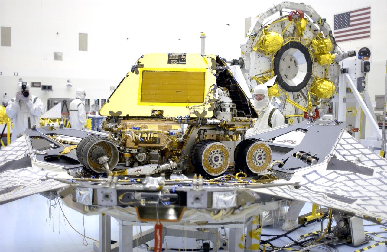 KENNEDY SPACE CENTER, FLA. - The Mars Exploration Rover 2 (MER-A) is ready for final closure of the petals on the lander.  The lander and rover will be enclosed within an aeroshell for launch.  The MER Mission consists of two identical rovers designed to cover roughly 110 yards each Martian day over various terrain. Each rover will carry five scientific instruments that will allow it to search for evidence of liquid water that may have been present in the planet's past.  Identical to each other, the rovers will land at different regions of Mars.  Launch date for this first of NASA's two Mars Exploration Rover missions is scheduled no earlier than June 6.