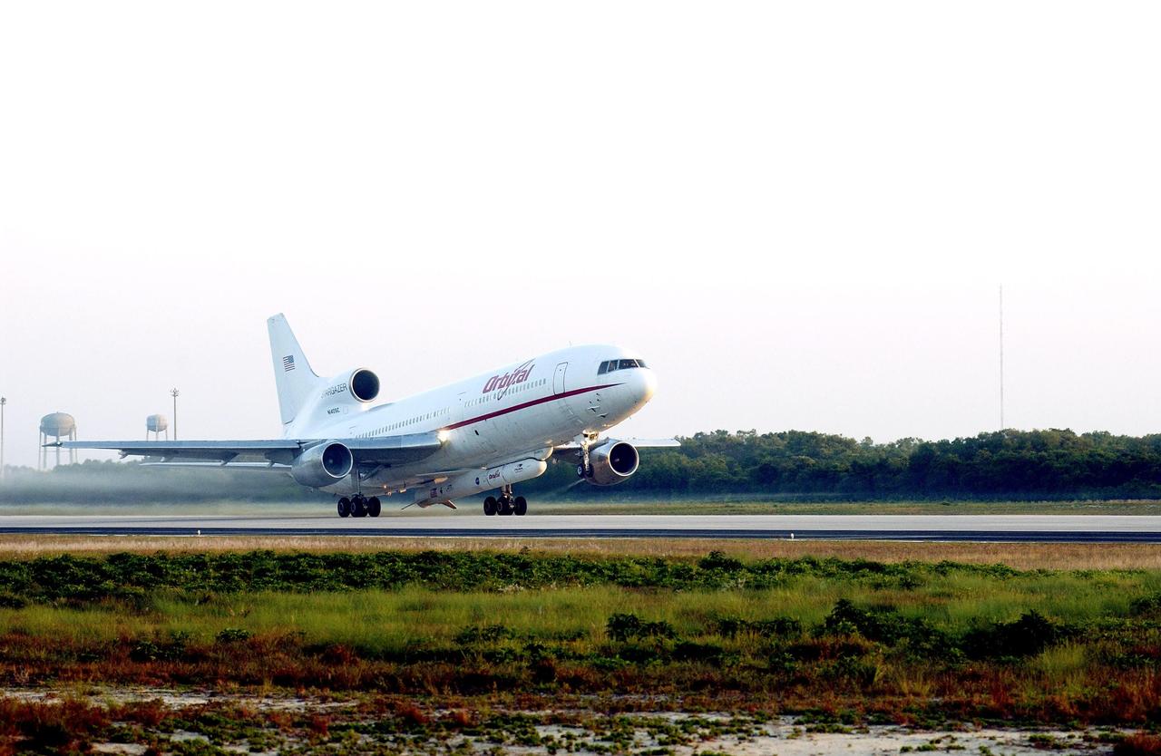 KENNEDY SPACE CENTER, FLA. - Orbital Sciences' L-1011 aircraft takes off from Cape Canaveral Air Force Station carrying the Pegasus XL rocket/Galaxy Evolution Explorer (GALEX) under its belly.  Release of the Pegasus was scheduled for about 8 a.m. over the Atlantic Ocean at an altitude of 39,000 feet at a location approximately 100 nautical miles offshore east-northeast of Cape Canaveral. Spacecraft separation from the Pegasus occurs 11 minutes later. At that time the satellite will be in a circular orbit of 431 statute miles (690 km) at a 29-degree inclination.   The GALEX will carry into space an orbiting telescope that will observe a million galaxies across 10 billion years of cosmic history to help astronomers determine when the stars and elements we see today had their origins. The spacecraft will sweep the skies for 28 months using state-of-the-art ultraviolet detectors to single out galaxies dominated by young, hot, short-lived stars that give off a great deal of energy at that wavelength.  These galaxies are actively creating stars, and therefore provide a window into the history and causes of star formation in galaxies.