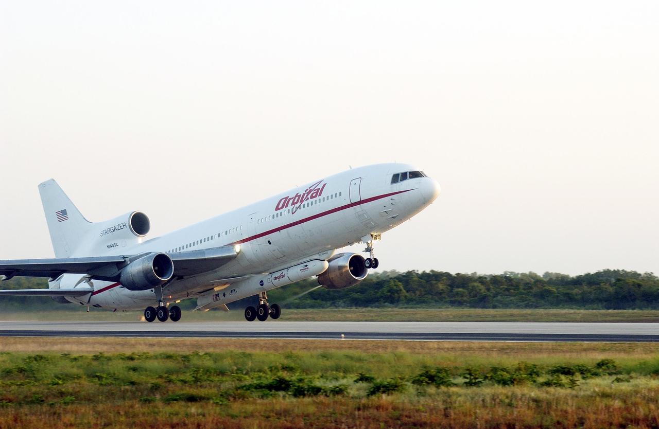 KENNEDY SPACE CENTER, FLA. - Orbital Sciences' L-1011 aircraft takes off from Cape Canaveral Air Force Station carrying the Pegasus XL rocket/Galaxy Evolution Explorer (GALEX) under its belly.  Release of the Pegasus was scheduled for about 8 a.m. over the Atlantic Ocean at an altitude of 39,000 feet at a location approximately 100 nautical miles offshore east-northeast of Cape Canaveral. Spacecraft separation from the Pegasus occurs 11 minutes later. At that time the satellite will be in a circular orbit of 431 statute miles (690 km) at a 29-degree inclination.  The GALEX will carry into space an orbiting telescope that will observe a million galaxies across 10 billion years of cosmic history to help astronomers determine when the stars and elements we see today had their origins. The spacecraft will sweep the skies for 28 months using state-of-the-art ultraviolet detectors to single out galaxies dominated by young, hot, short-lived stars that give off a great deal of energy at that wavelength.  These galaxies are actively creating stars, and therefore provide a window into the history and causes of star formation in galaxies.