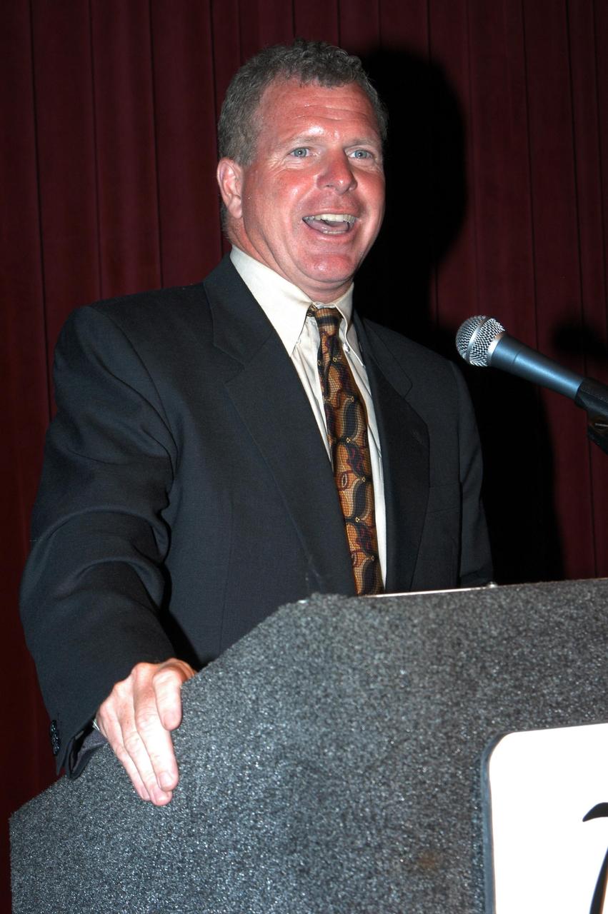 KENNEDY SPACE CENTER, FLA. - U.S. Representative Tom Feeney addresses attendees at the annual Congressional Dinner hosted by the Florida Space Business Roundtable. He discussed space, military and defense policy issues under consideration in Washington. The dinner kicked off the annual Space Congress, held April 28-May 1, 2003, in Cape Canaveral, Fla. The theme for the event was "Linking the Past to the Future: A Celebration of Space" and commemorated the 40th anniversary of the Kennedy Space Center and the Centennial of Flight.