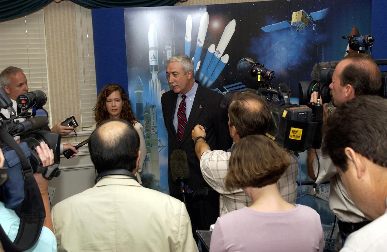 KENNEDY SPACE CENTER, FLA. - NASA Administrator Sean O'Keefe is interviewed by the media at the 40th Space Congress held April 28-May 1, 2003, in Cape Canaveral, Fla. On the left is Lisa Malone, associate director of External Relations and Business Development at KSC. The Space Congress is an international conference that gathers attendees from the scientific community, the space industry workforce, educators and local supporting industries. This year's event commemorated the 40th anniversary of the Kennedy Space Center and the Centennial of Flight. The theme for the Space Congress was "Linking the Past to the Future: A Celebration of Space."