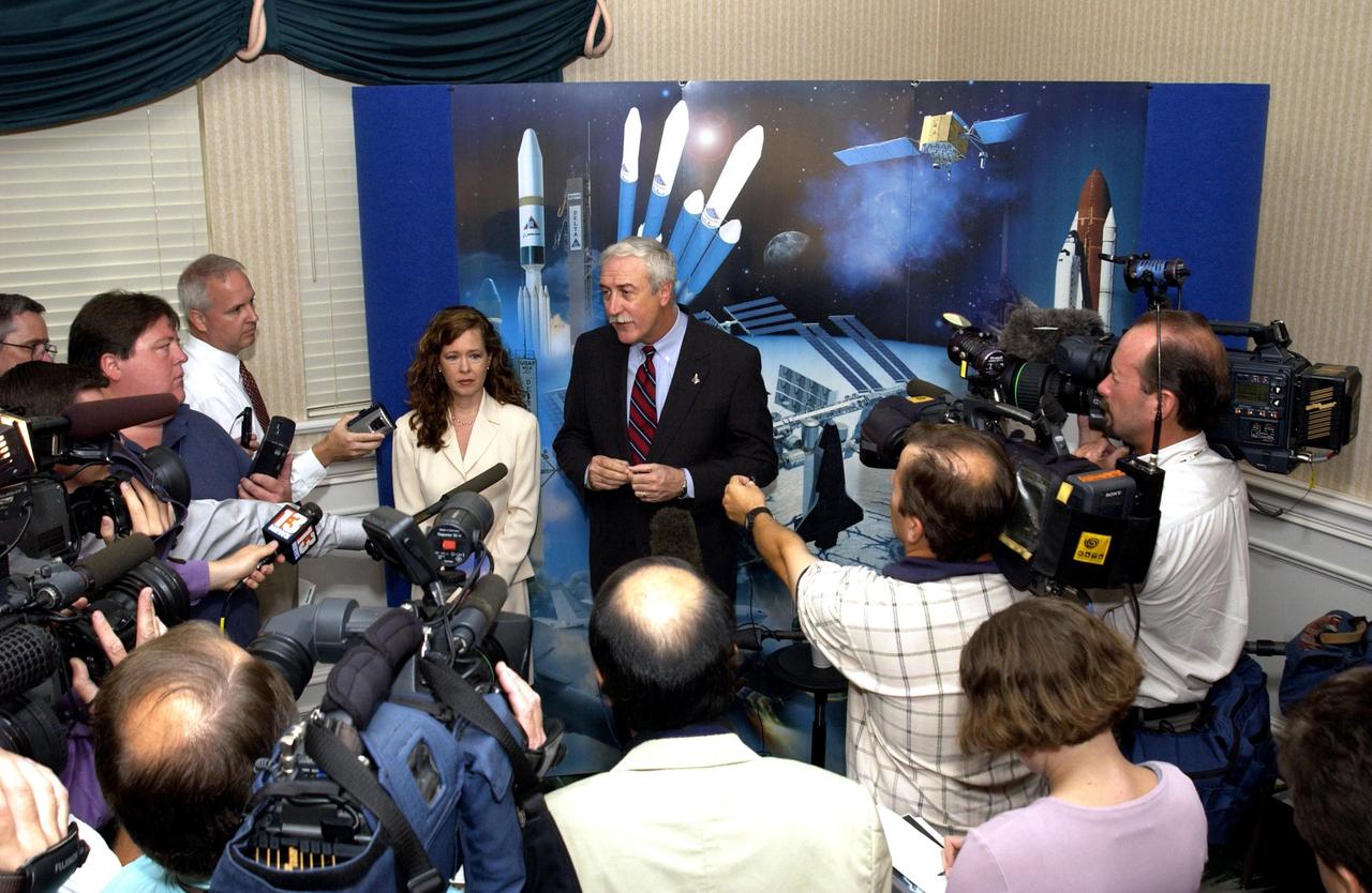 KENNEDY SPACE CENTER, FLA. - NASA Administrator Sean O'Keefe is interviewed by the media at the 40th Space Congress held April 28-May 1, 2003, in Cape Canaveral, Fla. On the left is Lisa Malone, associate director of External Relations and Business Development at KSC. The Space Congress is an international conference that gathers attendees from the scientific community, the space industry workforce, educators and local supporting industries. This year's event commemorated the 40th anniversary of the Kennedy Space Center and the Centennial of Flight. The theme for the Space Congress was "Linking the Past to the Future: A Celebration of Space."