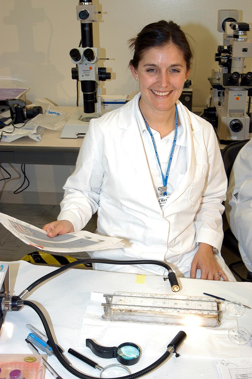 KENNEDY SPACE CENTER, FLA. -   Valerie Cassanto is one of the scientists recovering experiments found during the search for Columbia debris.  Included in the Commercial ITA Biomedical Experiments payload on mission STS-107 are urokinase cancer research, microencapsulation of drugs, the Growth of Bacterial Biofilm on Surfaces during Spaceflight (GOBBSS), and tin crystal formation.