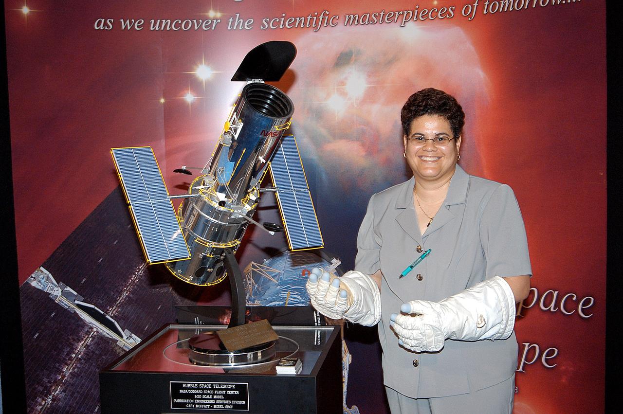 KENNEDY SPACE CENTER, FLA. -  A model of the Hubble Space Telescope is one of the exhibits during Space Congress Week, held April 29-May 2, 2003, in Cape Canaveral, Fla.  The Space Congress is an international conference that gathers attendees from the scientific community, the space industry workforce, educators and local supporting industries.  This year’s event commemorated the 40th anniversary of the Kennedy Space Center and the Centennial of Flight.  The theme for the Space Congress was “Linking the Past to the Future: A Celebration of Space.”