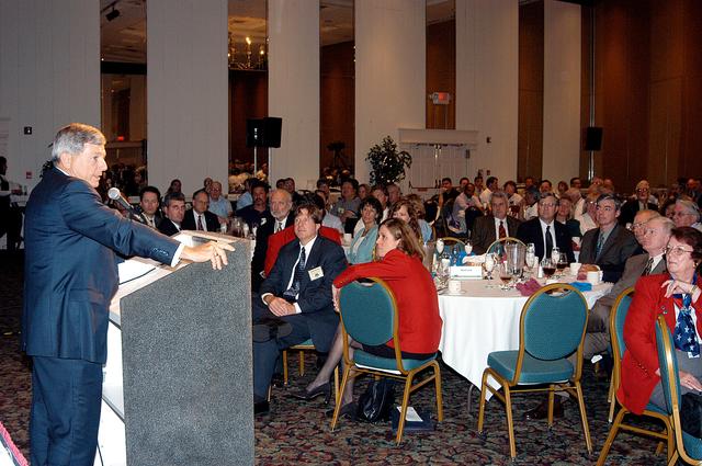 NASA image: KENNEDY SPACE CENTER, FLA. - At a luncheon during Space Congress Week, Michael Kostelnik, NASA deputy associate administrator for the Space Shuttle and the International Space Station, speaks to luncheon attendees about the future challenges the Agency faces.  Held April 29-May 2, 2003, in Cape Canaveral, Fla., the Space Congress is an international conference that gathers attendees from the scientific community, the space industry workforce, educators and local supporting industries.  This year's event commemorated the 40th anniversary of the Kennedy Space Center and the Centennial of Flight.  The theme for the Space Congress was "Linking the Past to the Future: A Celebration of Space."