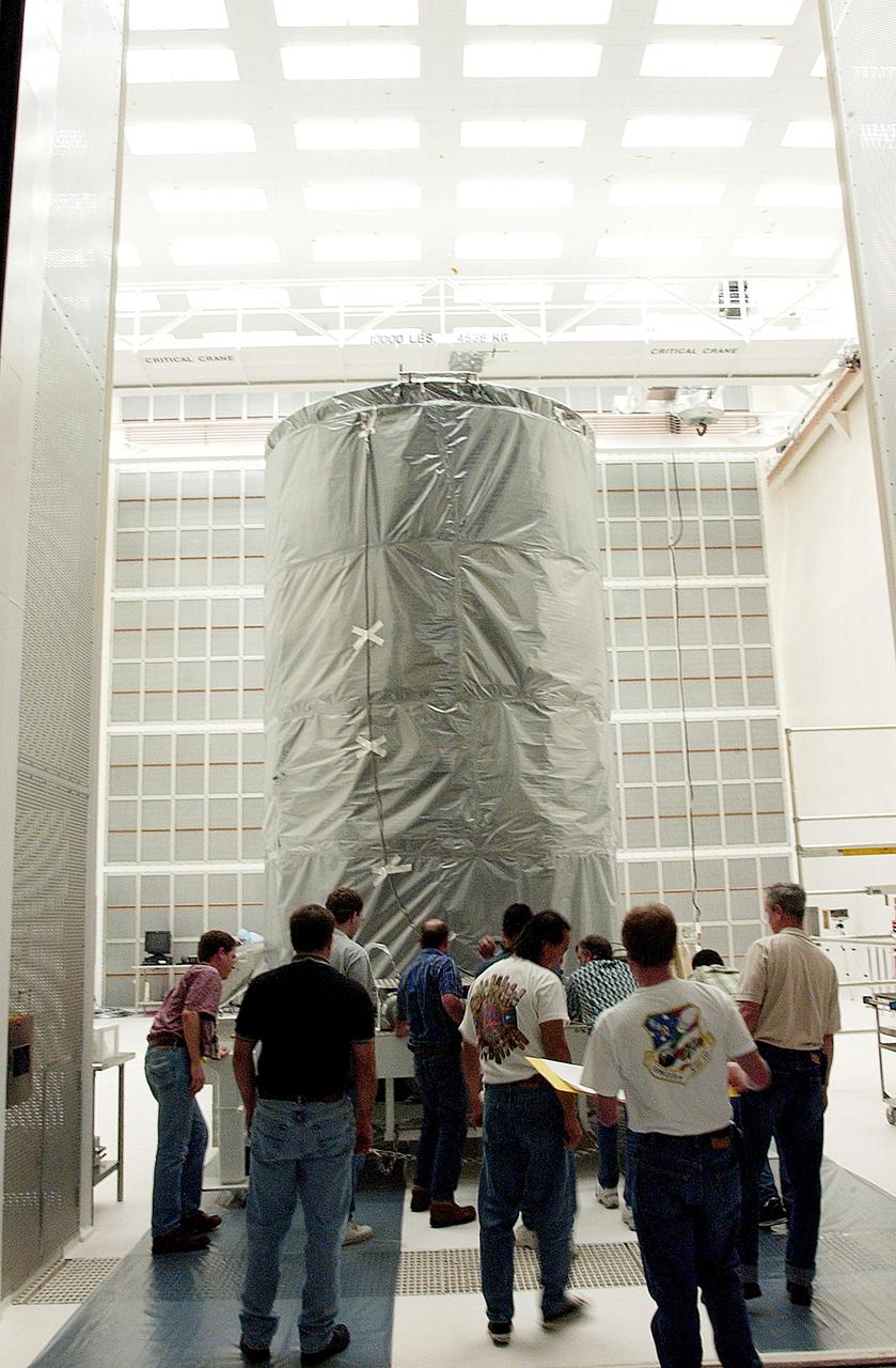 KENNEDY SPACE CENTER, FLA. -  At Cape Canaveral Air Force Station, the Space Infrared Telescope Facility (SIRTF) observatory is moved into NASA Spacecraft Hangar AE. SIRTF will remain in the clean room at Hangar AE until it returns to the pad in early August.