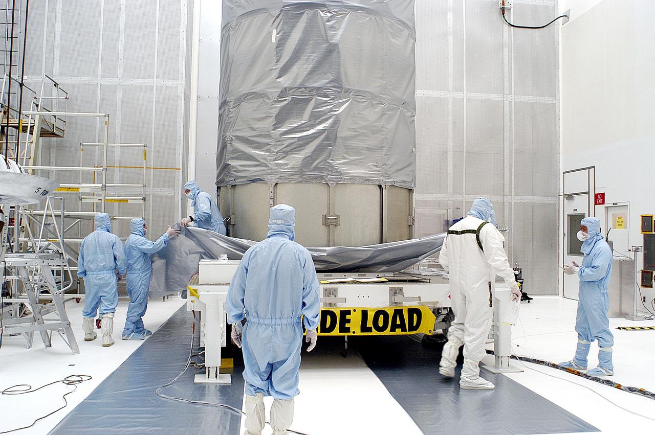 KENNEDY SPACE CENTER, FLA. -  The Space Infrared Telescope Facility (SIRTF) has been returned to NASA Spacecraft Hangar AE from the launch pad.   It will remain in the clean room until it returns to the pad in early August.  One of NASA's largest infrared telescopes to be launched, SIRTF will obtain images and spectra by detecting the infrared energy, or heat, radiated by objects in space.